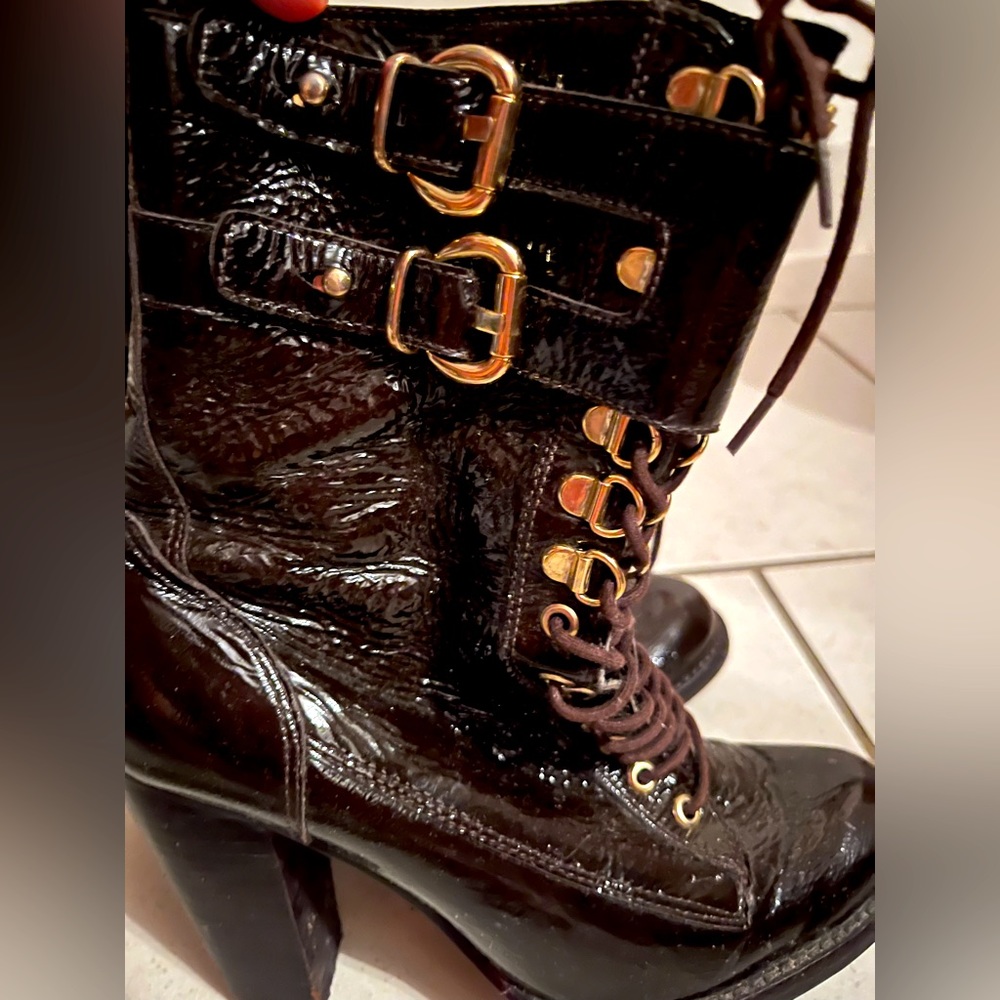 Michael Kors mid-lengtg patten leather healed boots.